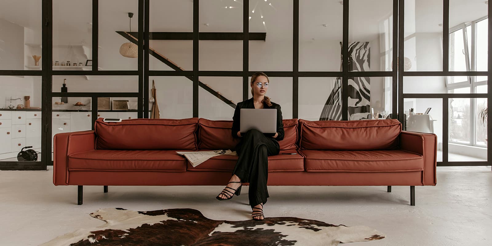 Interior designer curating moodboard materials and space layout